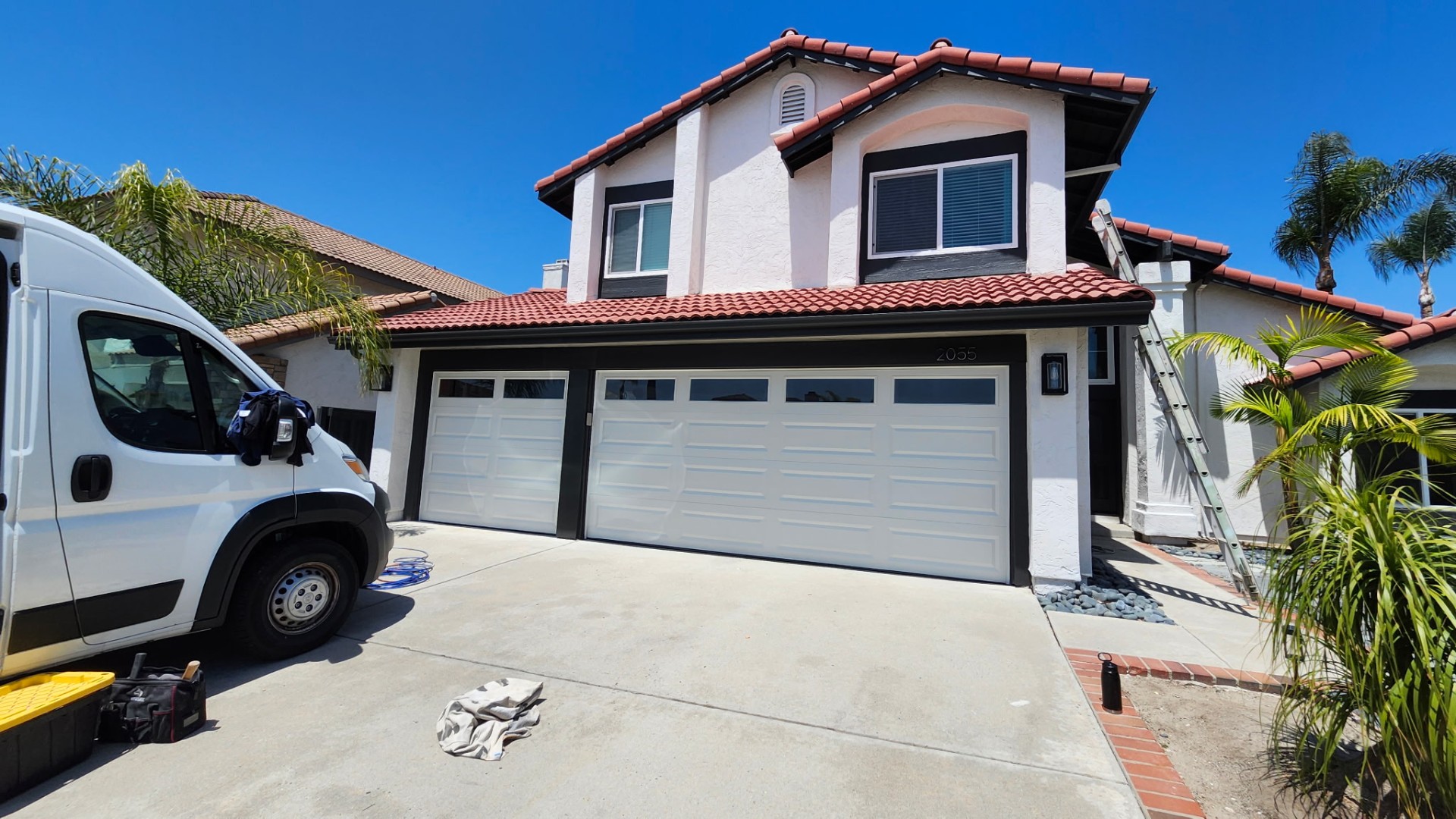 Home exterior with garage after